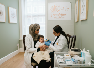 Professional baby ear piercing procedure at Dandelion Wellness Centre in Holborn, Central London